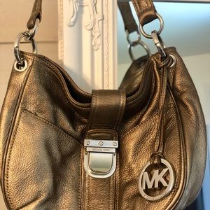 Small bronze/gold Michael Kors hobo bag